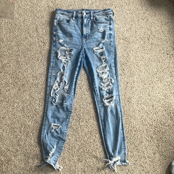 COPY - These are high rise, ripped jeans from American Eagle. The color is ligh… - Picture 2 of 6